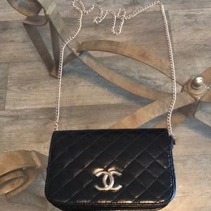 Black and gold chain quilted purse